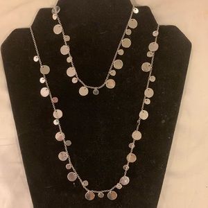 Very long delicate silver necklace
